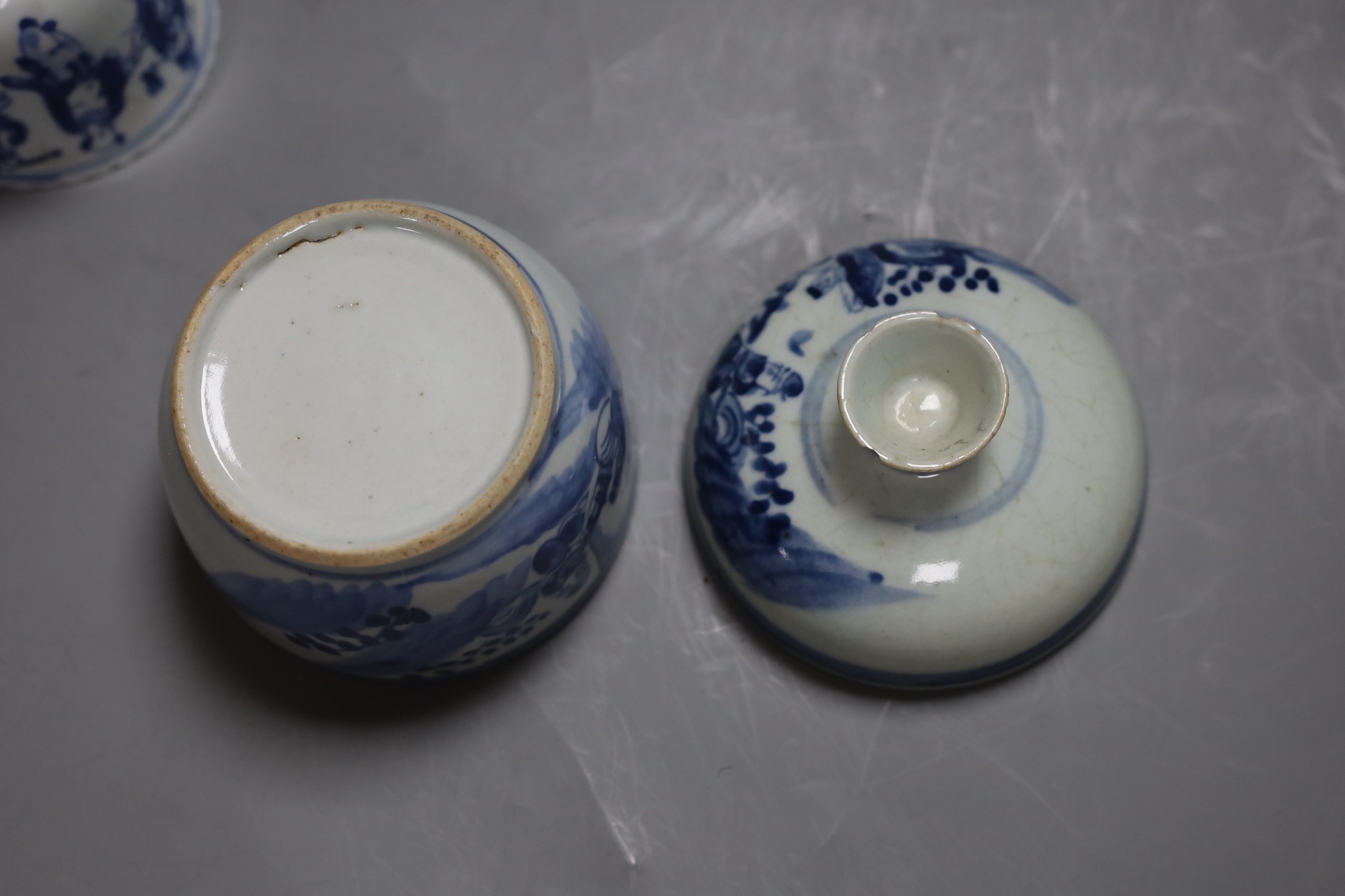 A 19th century blue and white jar with cover and a similar cup, Jar and cover 13 cms high